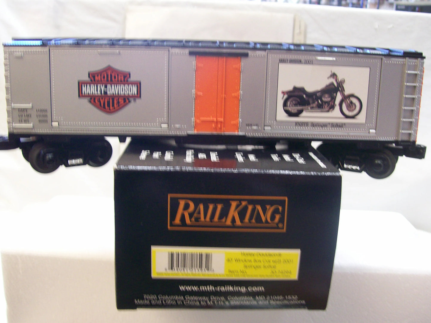 MTH # 30-74294 ( 40' Window Box Car)  with (2) 2001 Springer Softail - Harley-Davidson