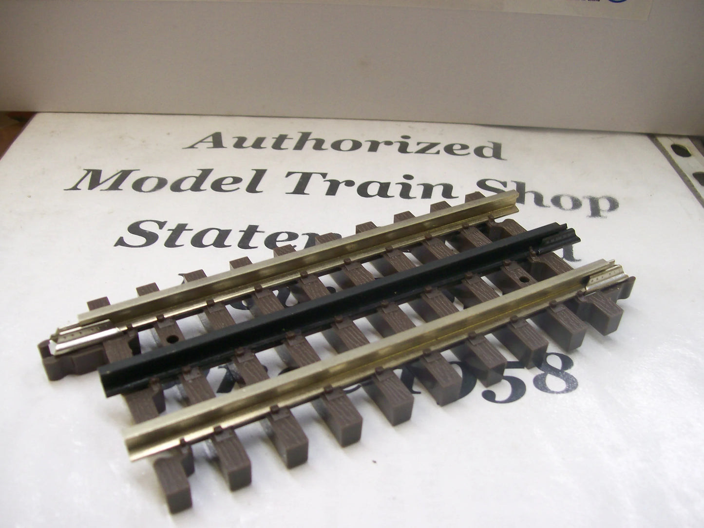 Atlas O Gauge # 6051 ( 4-1/2")  Straight Track O Scale Nickel Silver ( Sold Each )