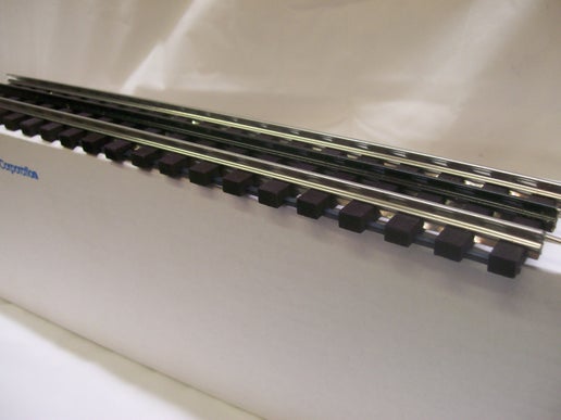 Gar Graves # WT-101-12 ( O Gauge)  Rigid Phantom Tinplate ( 12-Pack ) 12.4" Straight Track w/ Wood Ties