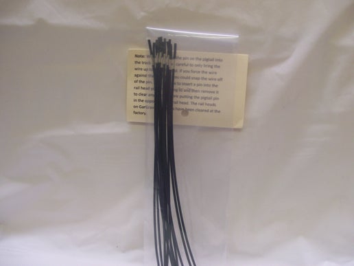 Gar Graves # 930B-12 ( Pack of 12 ) 8 Inch Black Pig Tails with Track Pin..